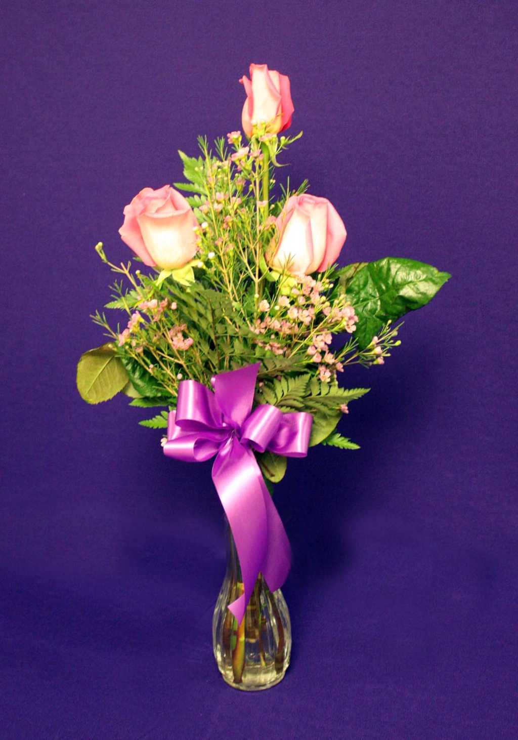Pink Roses with purple ribbon floral arrangement from Mon General Hospital Gift Shop